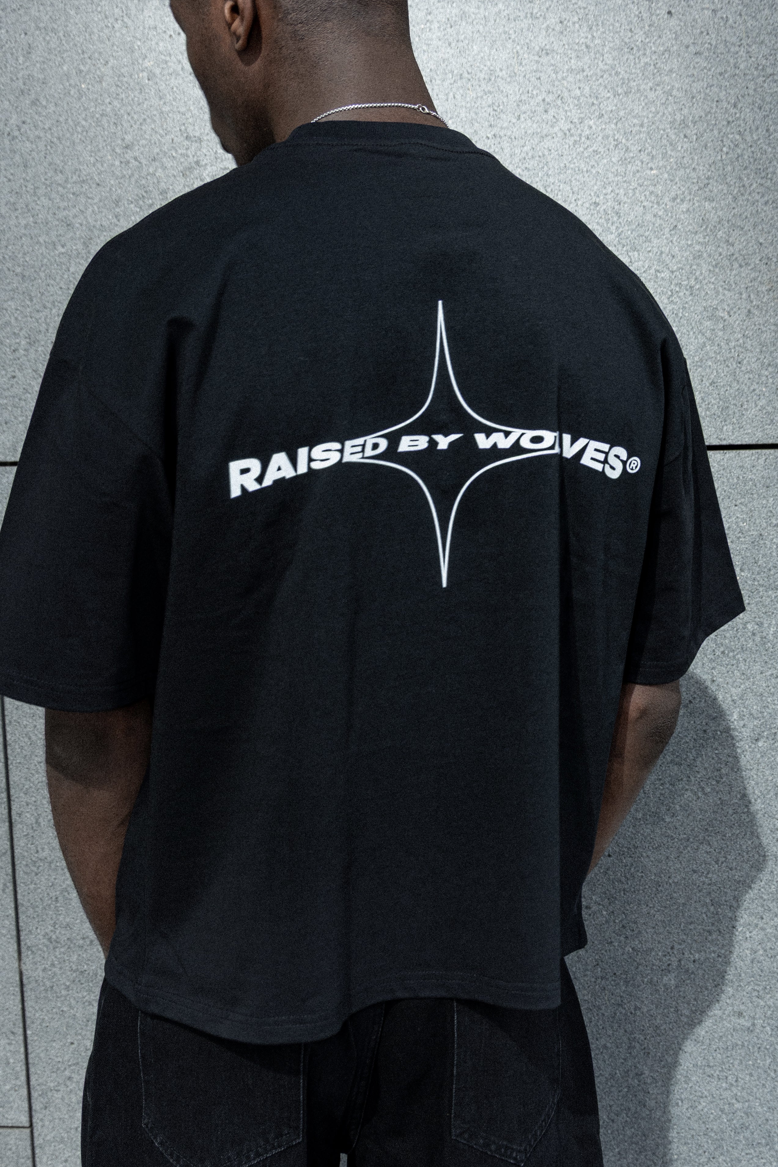 RAISED BY WOLWES